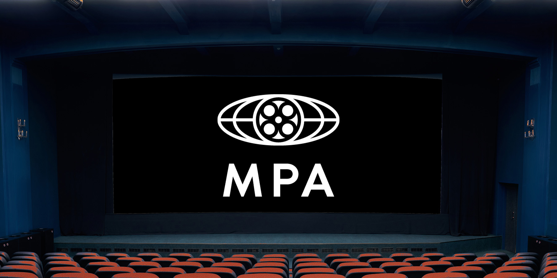 Motion Pictures Association (MPA) logo on the big screen of a movie theatre.