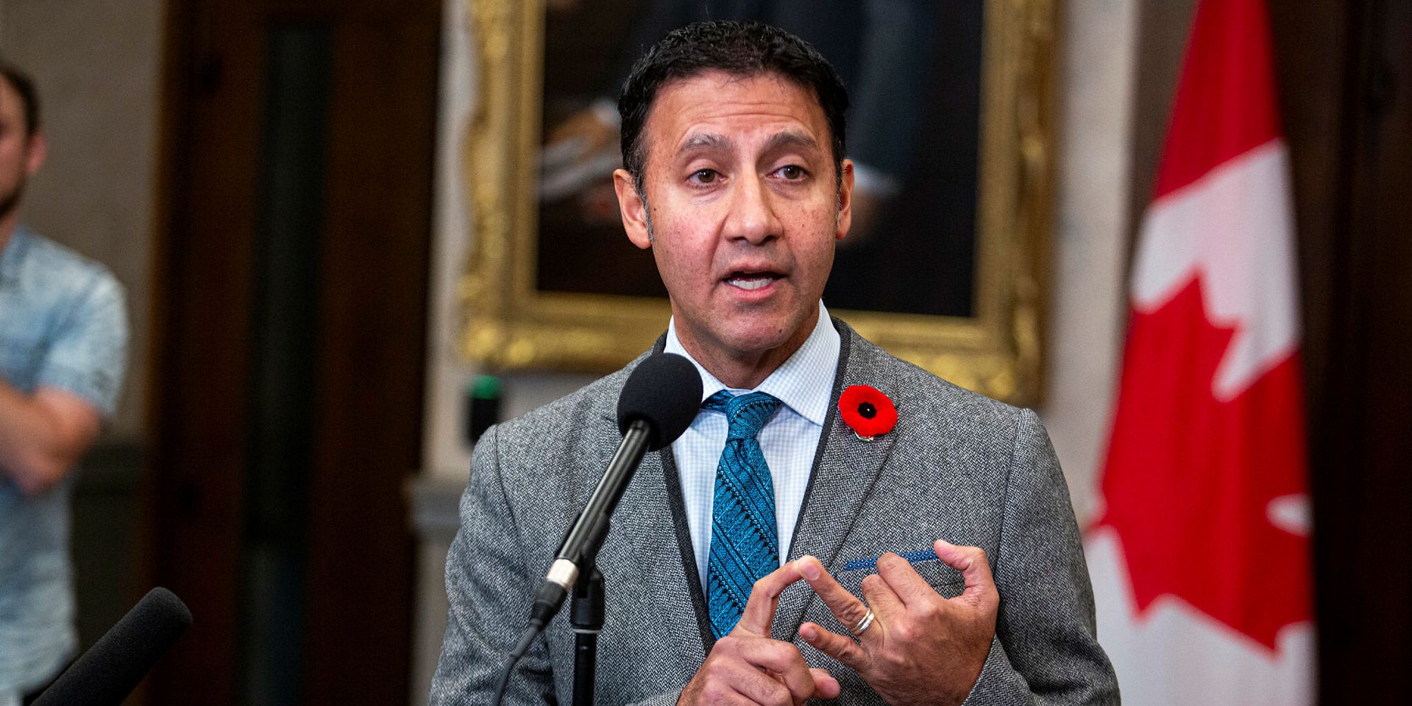 Minister of Justice and Attorney General Arif Virani speaks with reporters in the House of Commons foyer